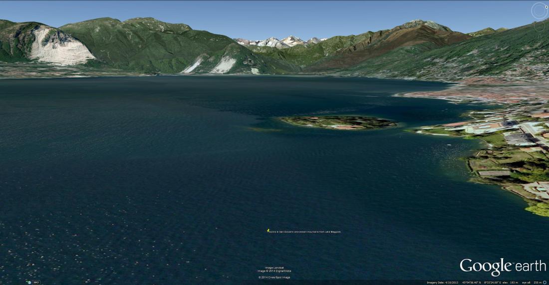 Google Earth aerial view of Isolina di San Giovanni, with Pallanza to the right, and the snow-capped Weissmies in the distance.  Ruskin recorded the view from a rowing boat.