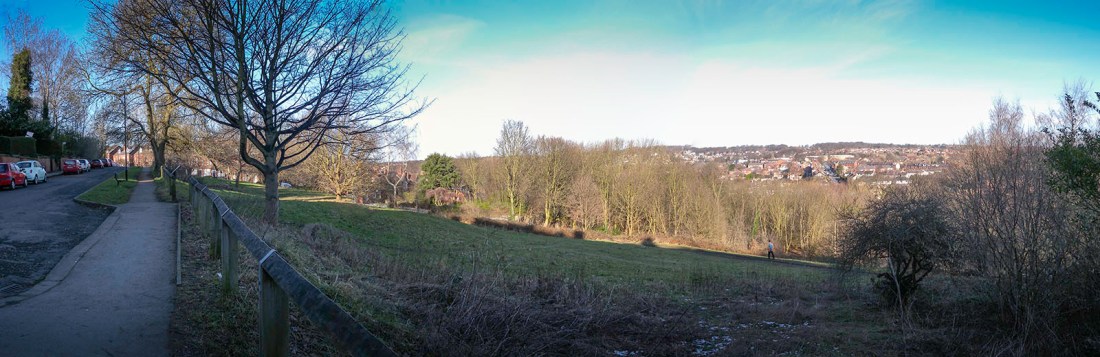 ‘Cardboard Hill’ from Ridge Terrace, Headingley Photograph by David Hill, taken 3 February 2015, 11.27 Looking along Ridge Terrace towards Wood Lane, at the north-western end of Woodhouse Ridge. The grassy slopes are called ‘Cardboard Hill’ recalling their use for cardboard sledging. Grimshaw’s view is obscured by the houses at the end of Wood Lane, but the flower meadows remember the character that Grimshaw records in his watercolour. Click on image to view at full size.