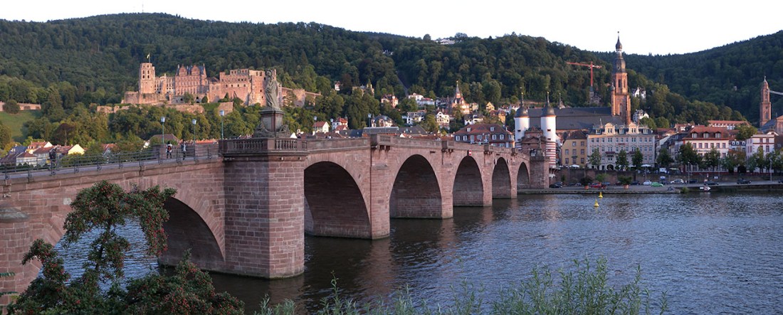 Heidelberg Bridge, Castle and Town Photograph by David Hill, taken 25 August 2015, 17.49 GMT Sadly, Turner’s sketch from the Schlangenweg is one of the only subjects that I did not manage to photograph from the exact spot. How it evaded my attention I cannot tell. It seems evident enough that I am not of the same indefatigability as Turner. It may be that eating ice-cream and sitting down played some part in the omission. For now all I can offer is this photograph taken from the same angle but loafing idly on the riverside. bjraven has a photograph taken from a similar angle to the Turner on Panoramio: http://www.panoramio.com/photo_explorer#user=447152&with_photo_id=41674259&order=date_desc 