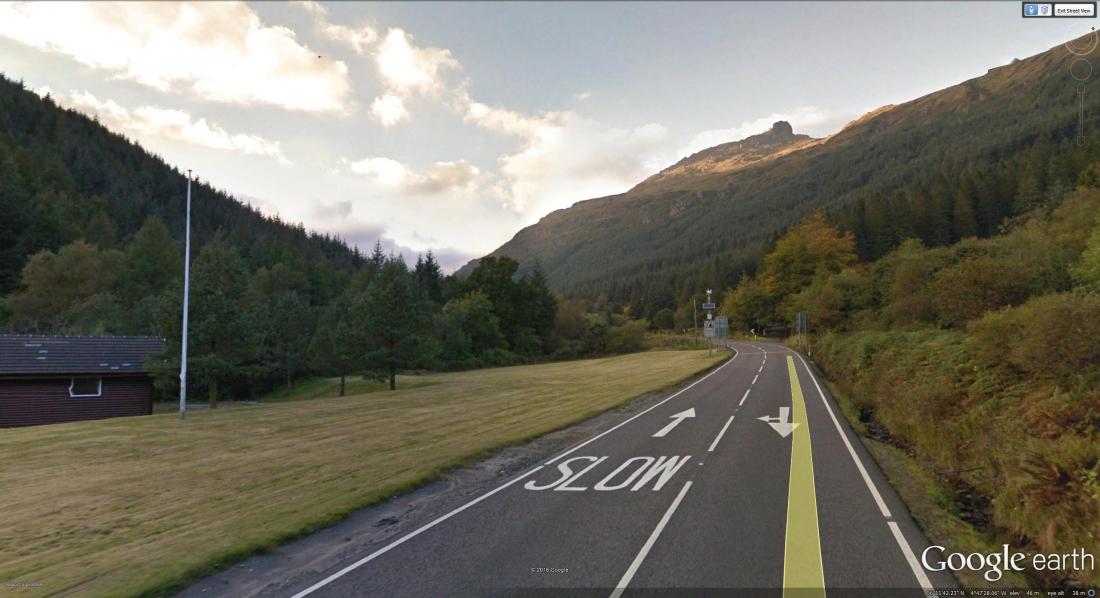 Google Earth Street View image of Ben Arthur from above Ardgartan Google Earth’s photograph is a very wide angle of view that visually diminishes the mountain. In fact the rocky summit seems very much more imposing, and the bulk of the mountain very much greater.